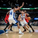 Basketball guard dribbling during a pick-and-roll play, looking for an open pass or shot.